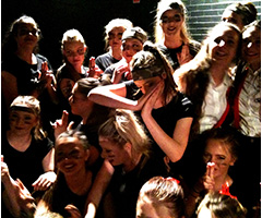 Students backstage having fun during Dancefest